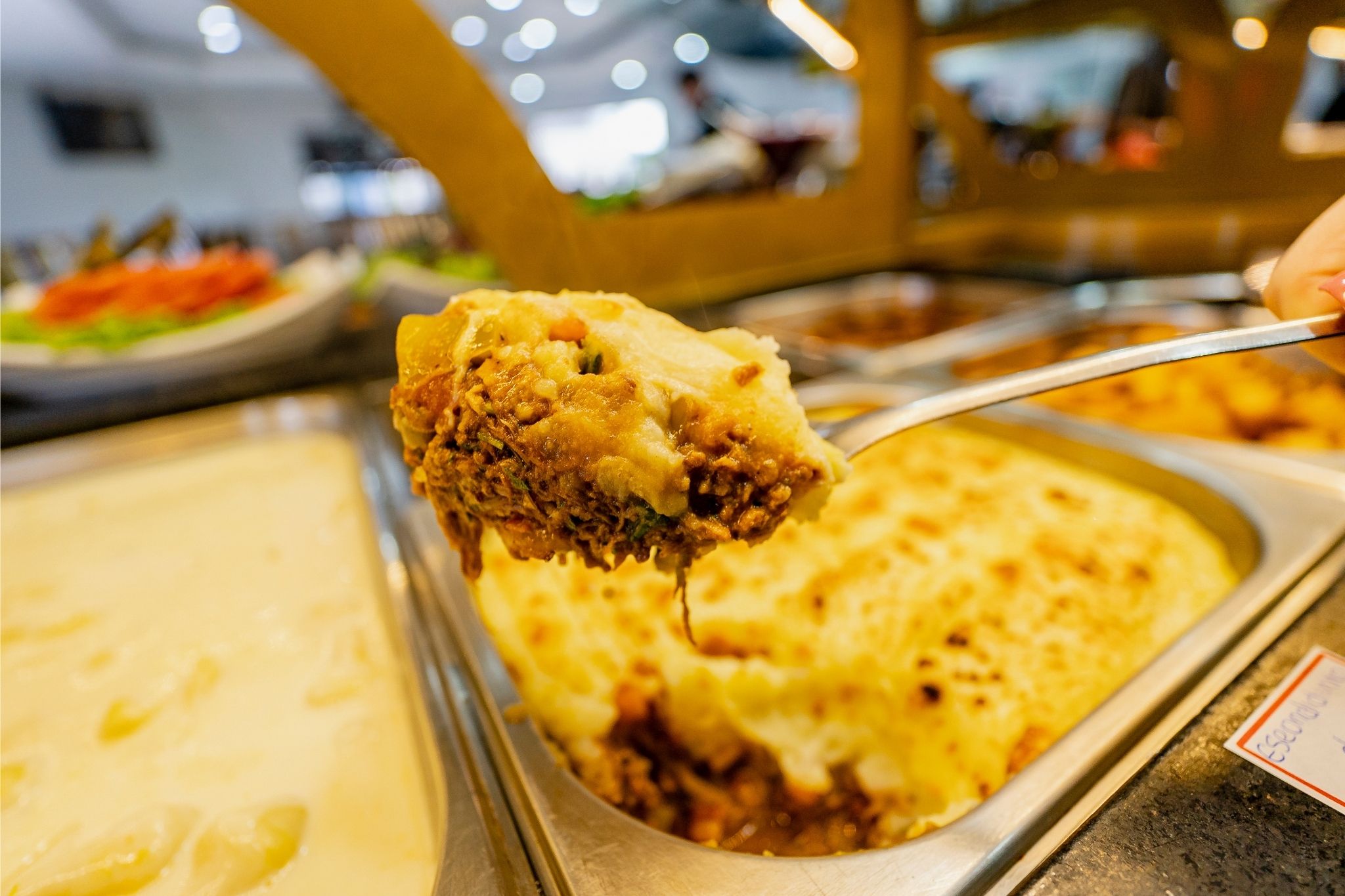 Lasanha 4 queijos gratinada do rodízio de massas na Churrascaria Boi Dourado